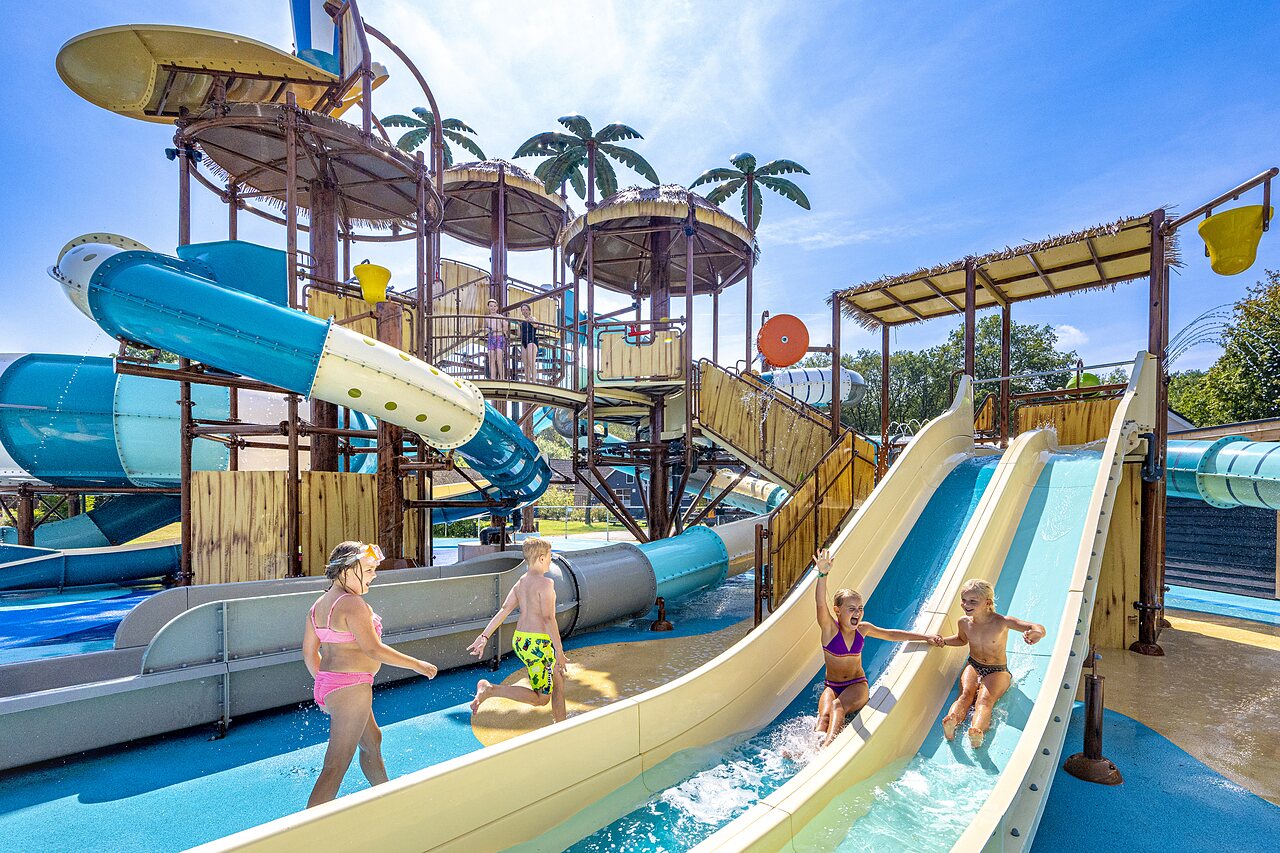 Water park with slides and children playing at CAPFUN De Belten campsite in Rheeze.