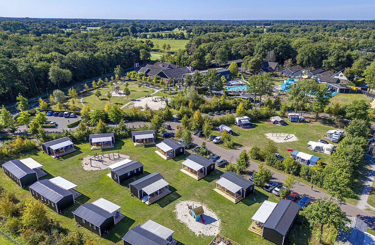 CAPFUN De Belten campsite in Rheeze: aerial view, chalets, pool and slides.