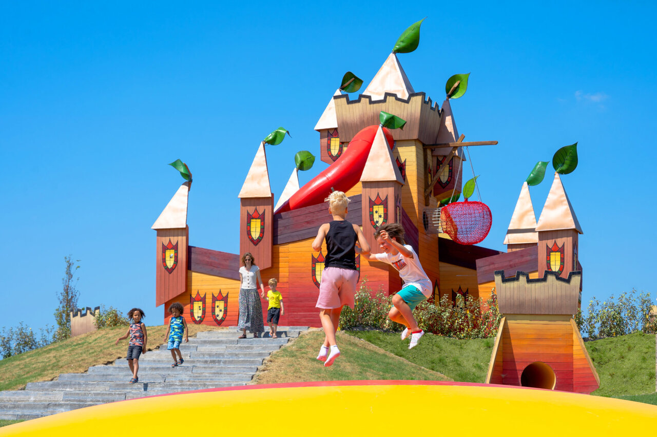 Castle playground, slide, trampoline for children at CAPFUN De Bongerd.