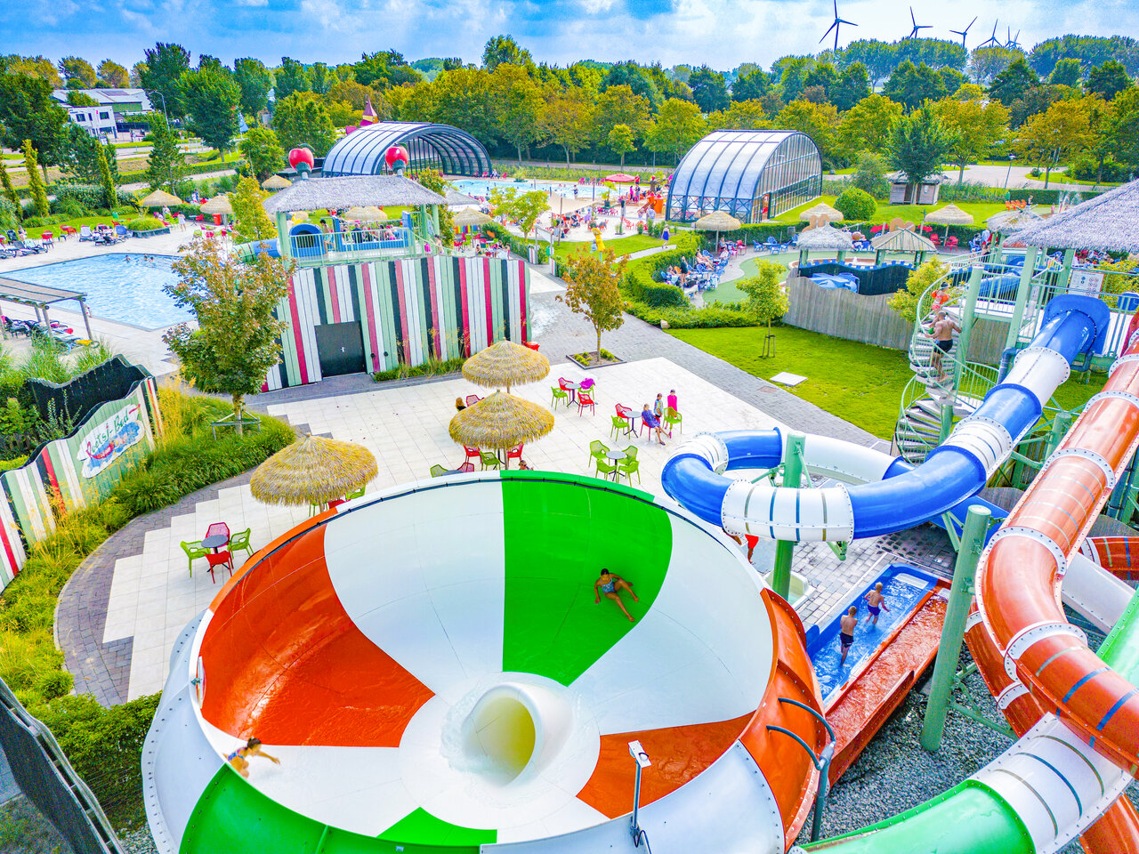 Water park with giant slides and swimming pools at CAPFUN De Bongerd campsite in Tuitjenhorn.