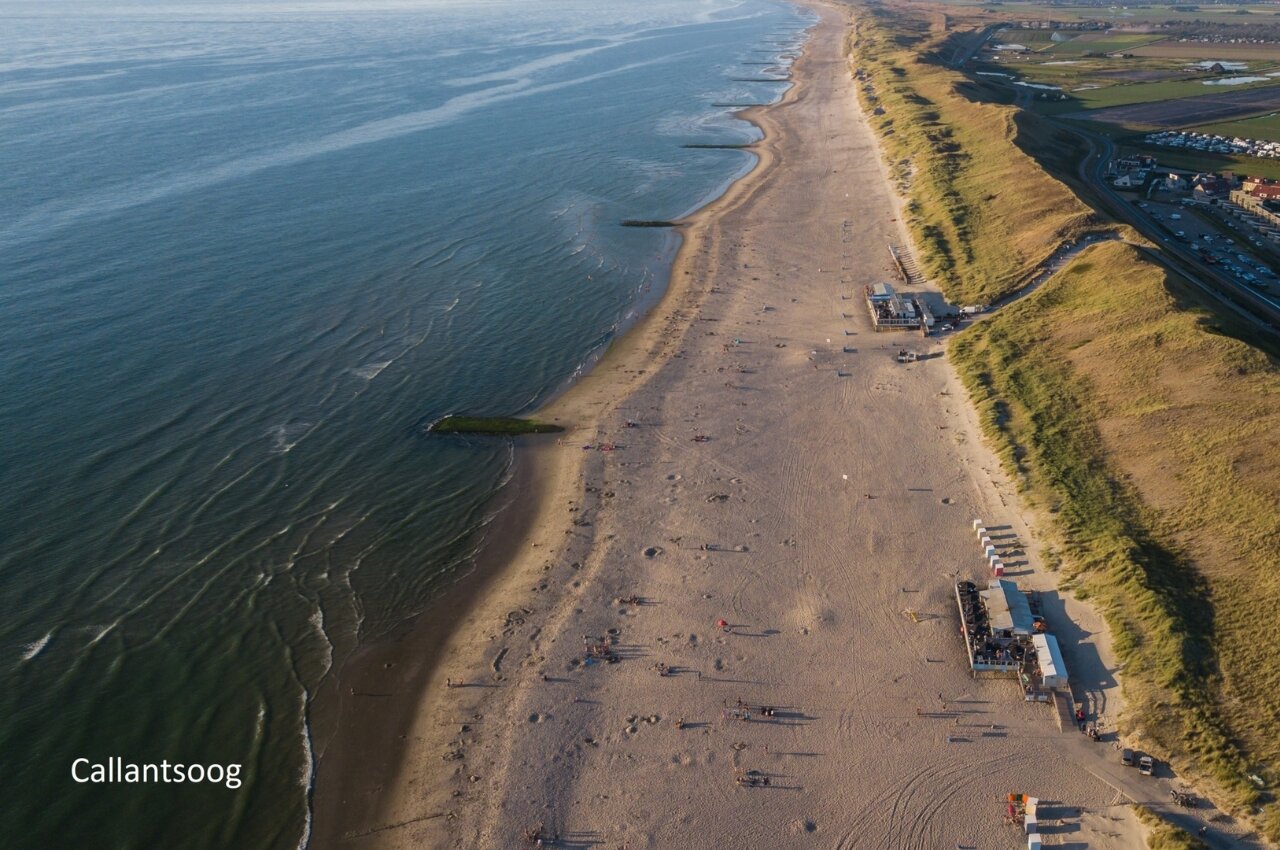 Sandy beach and sea in Callantsoog, a place to visit near the campsite.