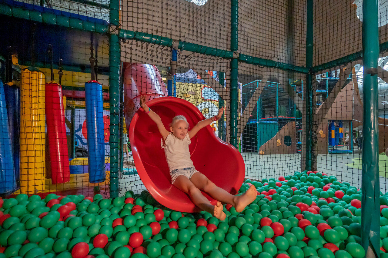 Slide, ball pit at CAPFUN De Bongerd campsite in Tuitjenhorn.