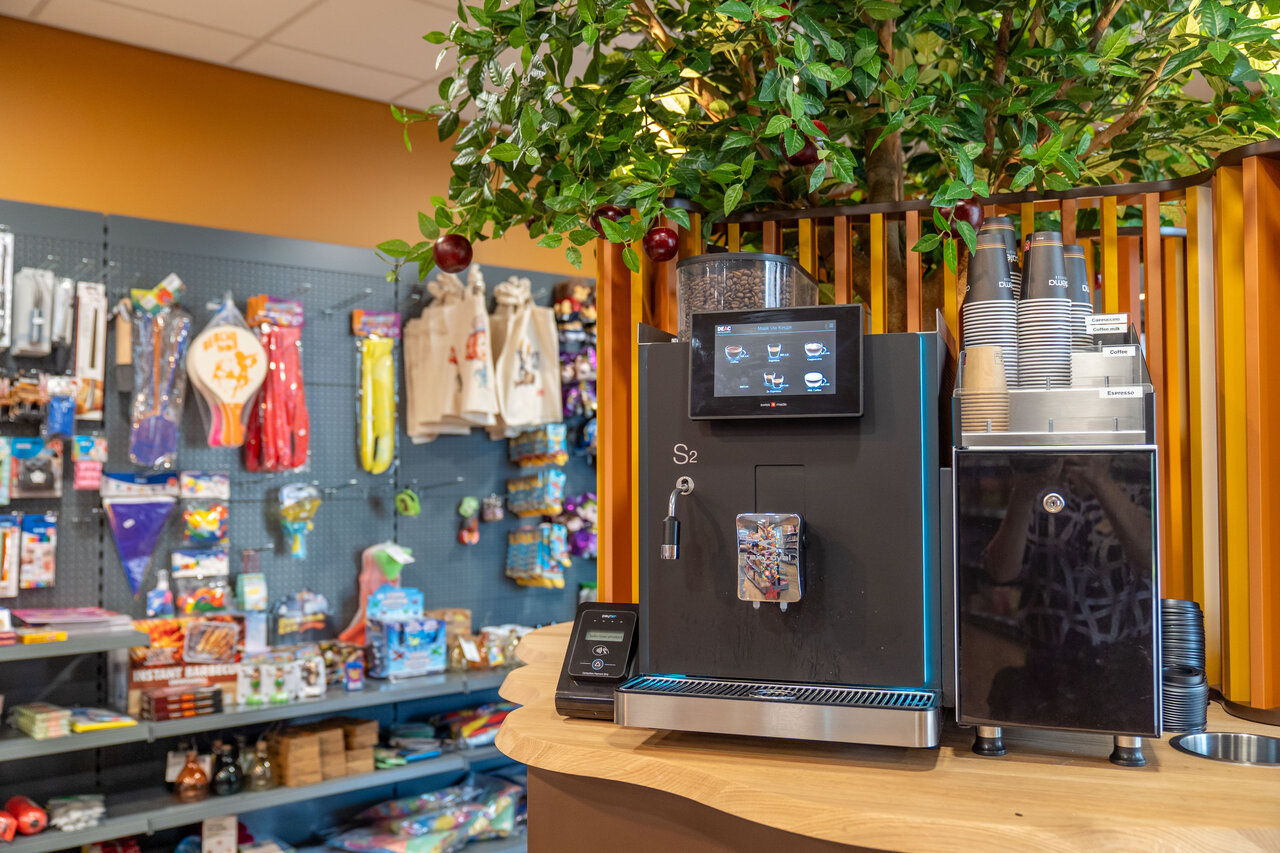 Self-service coffee machine and grocery store at CAPFUN De Bongerd campsite in Tuitjenhorn.