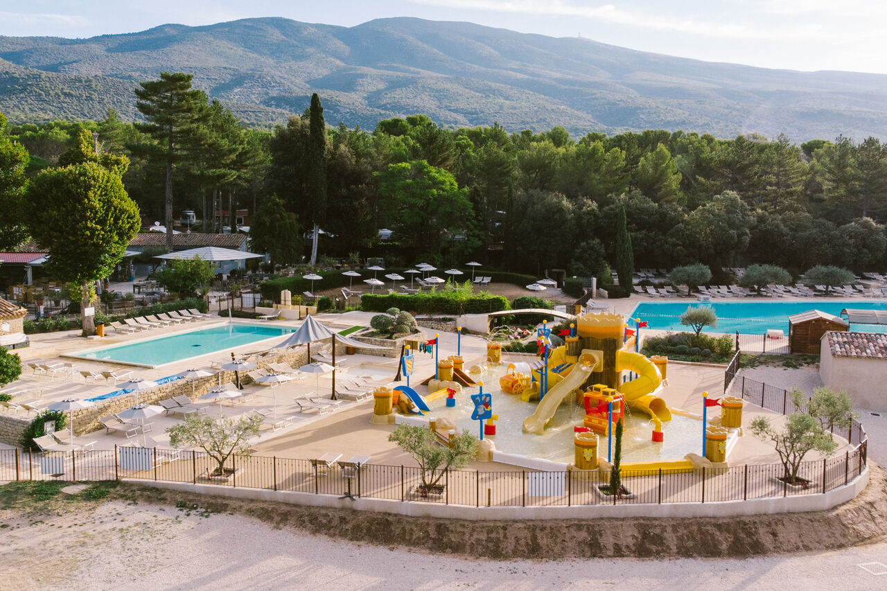 Water park, slides and outdoor pools at LIBRANOO Naturiste Belezy campsite in B�doin (84).