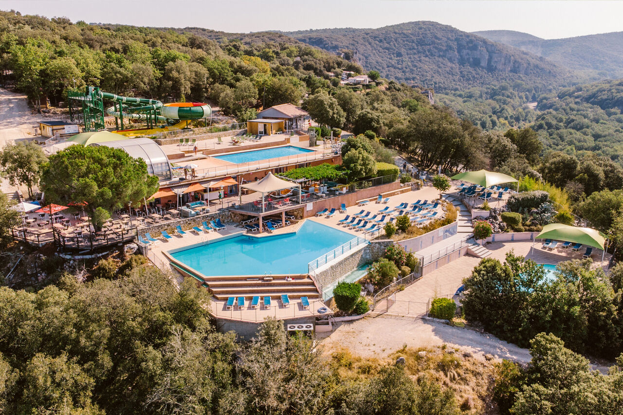 Pools, water slides, sun terraces at LIBRANOO Naturiste Sabliere campsite in Barjac (30).