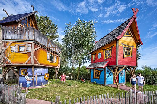 Colorful unusual elevated accommodations at CAPFUN Donjon de Lars campsite in Courseulles-sur-Mer.