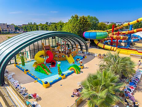 Water park, slides, covered pool at CAPFUN Donjon de Lars, Courseulles-sur-Mer.