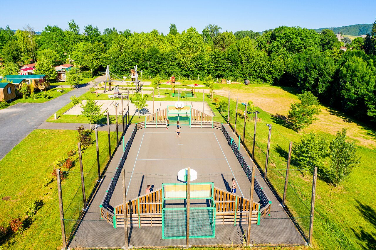 Multi-sport court and playground, aerial view at CAPFUN Duravel (46).