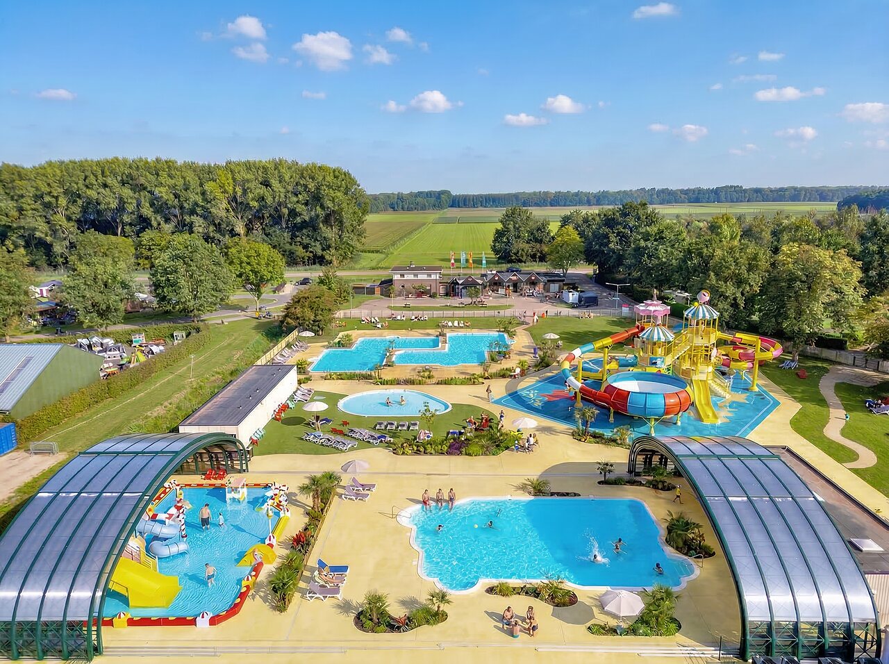Large water park with pools and slides at CAPFUN Erkemederstrand campsite in Zeewolde.