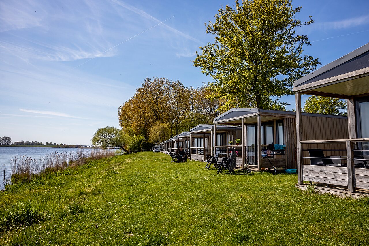 Modern mobile homes by the water, CAPFUN Erkemederstrand campsite in Zeewolde.