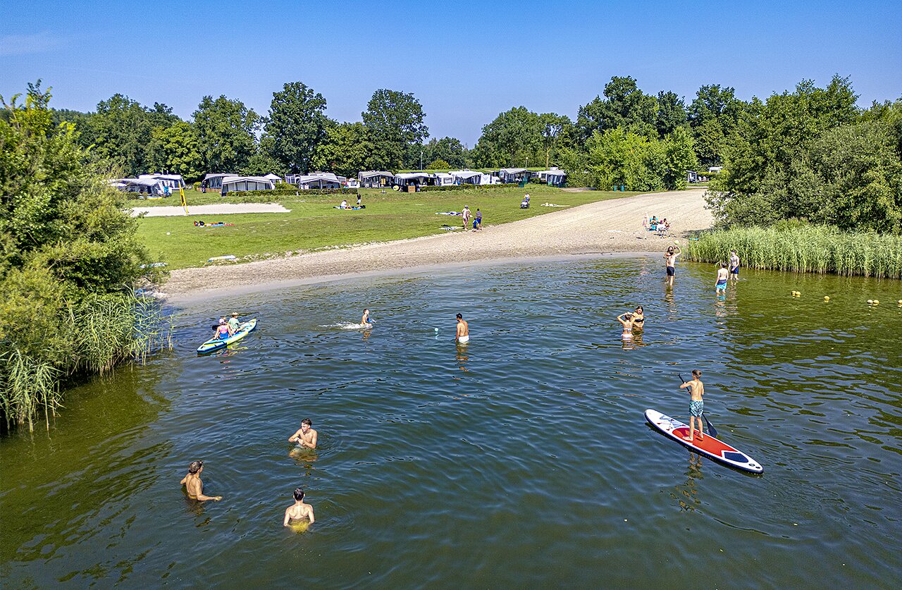 Water activities, sandy beach and camping pitches at CAPFUN Erkemederstrand in Zeewolde.