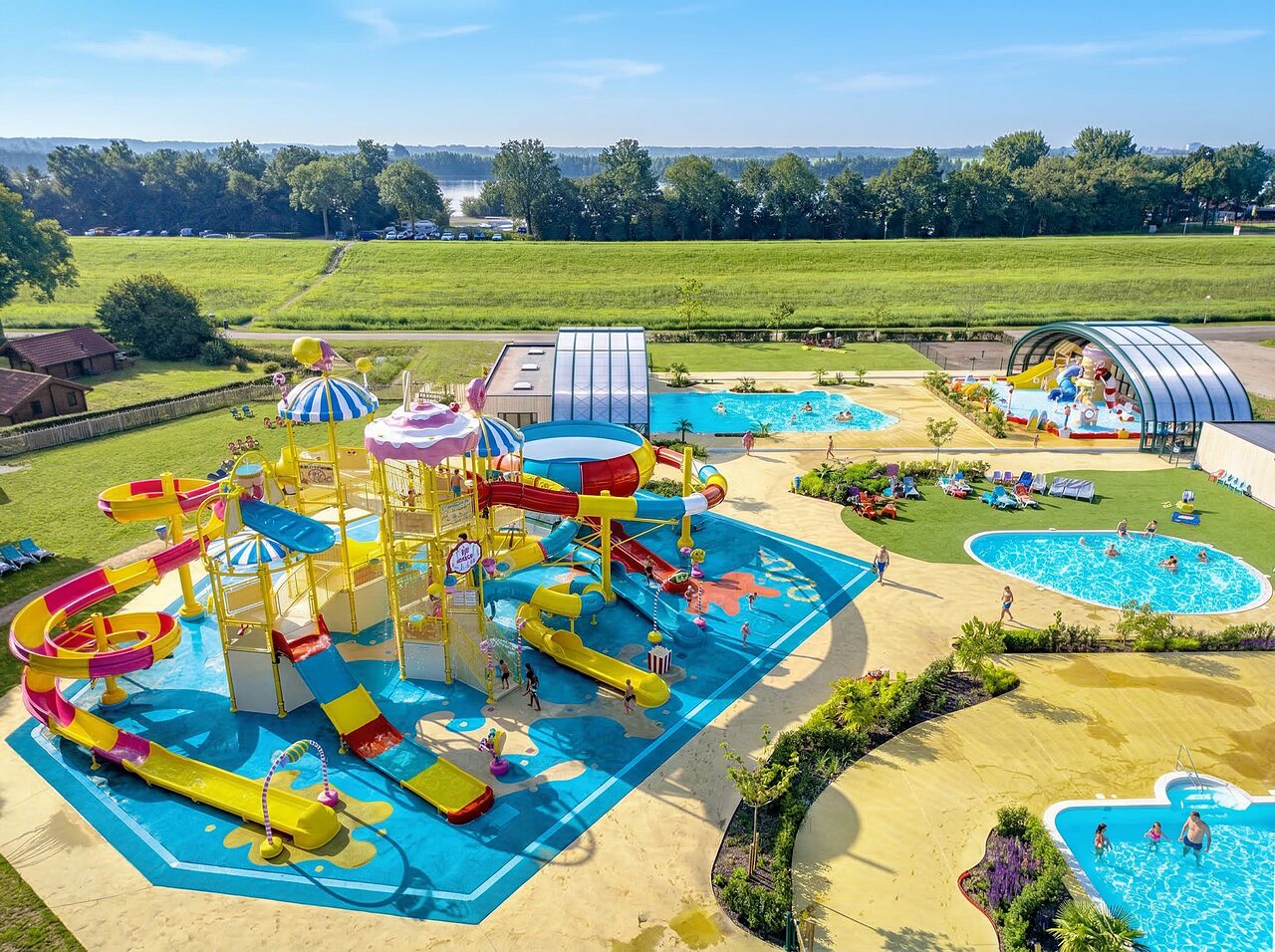 Water park, colorful slides and pools CAPFUN Erkemederstrand campsite in Zeewolde.