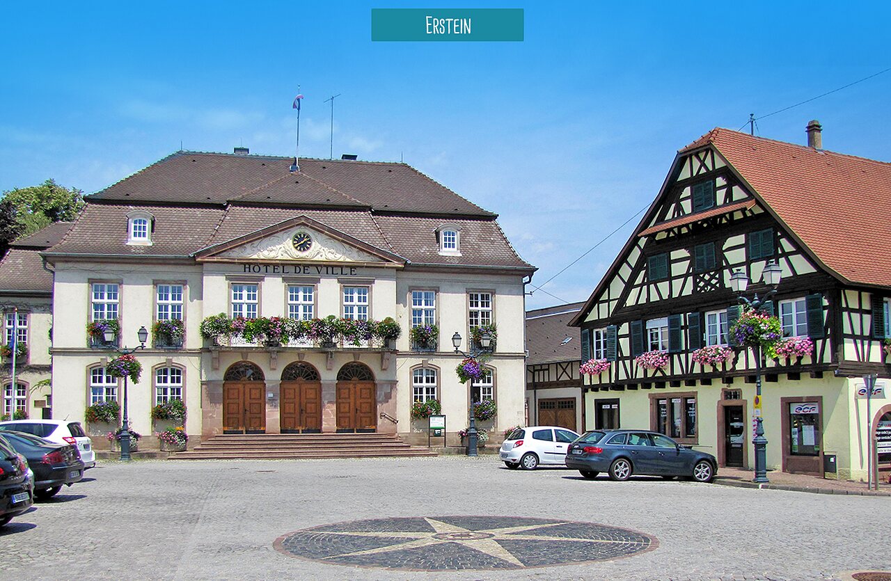 Town Hall and traditional houses in Erstein, a town to visit in Alsace.