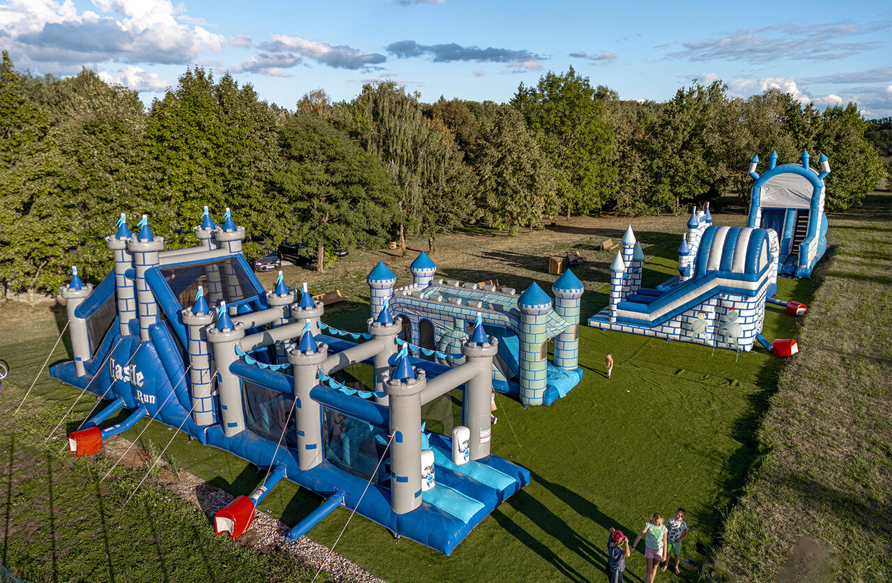 Inflatable play structures for children at CLICOCHIC Etang de la Mutche campsite.