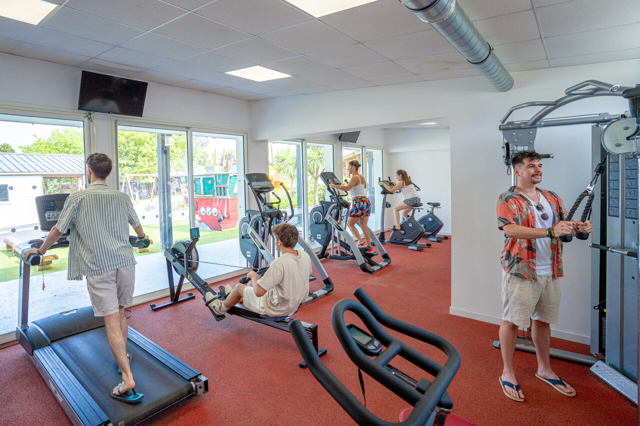 Modern gym, fitness equipment at CAPFUN L'Eve campsite in Saint-Marc-sur-Mer.