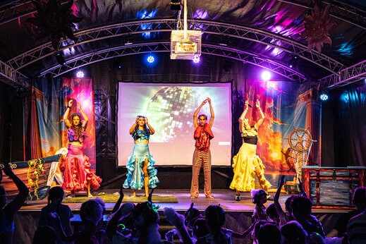 Dancers show on stage with giant screen at CAPFUN L'Eve campsite in Saint-Marc-sur-Mer.