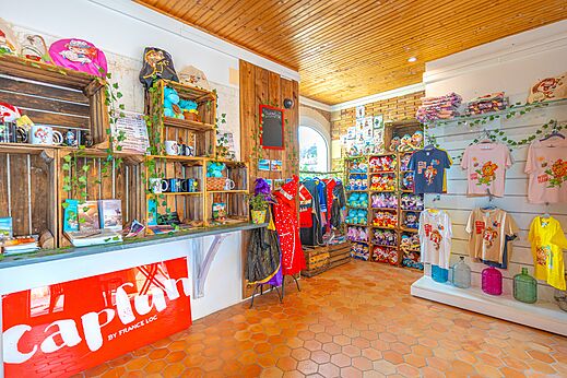 Capfun souvenir shop with plush toys and clothes at CAPFUN Falaises campsite.