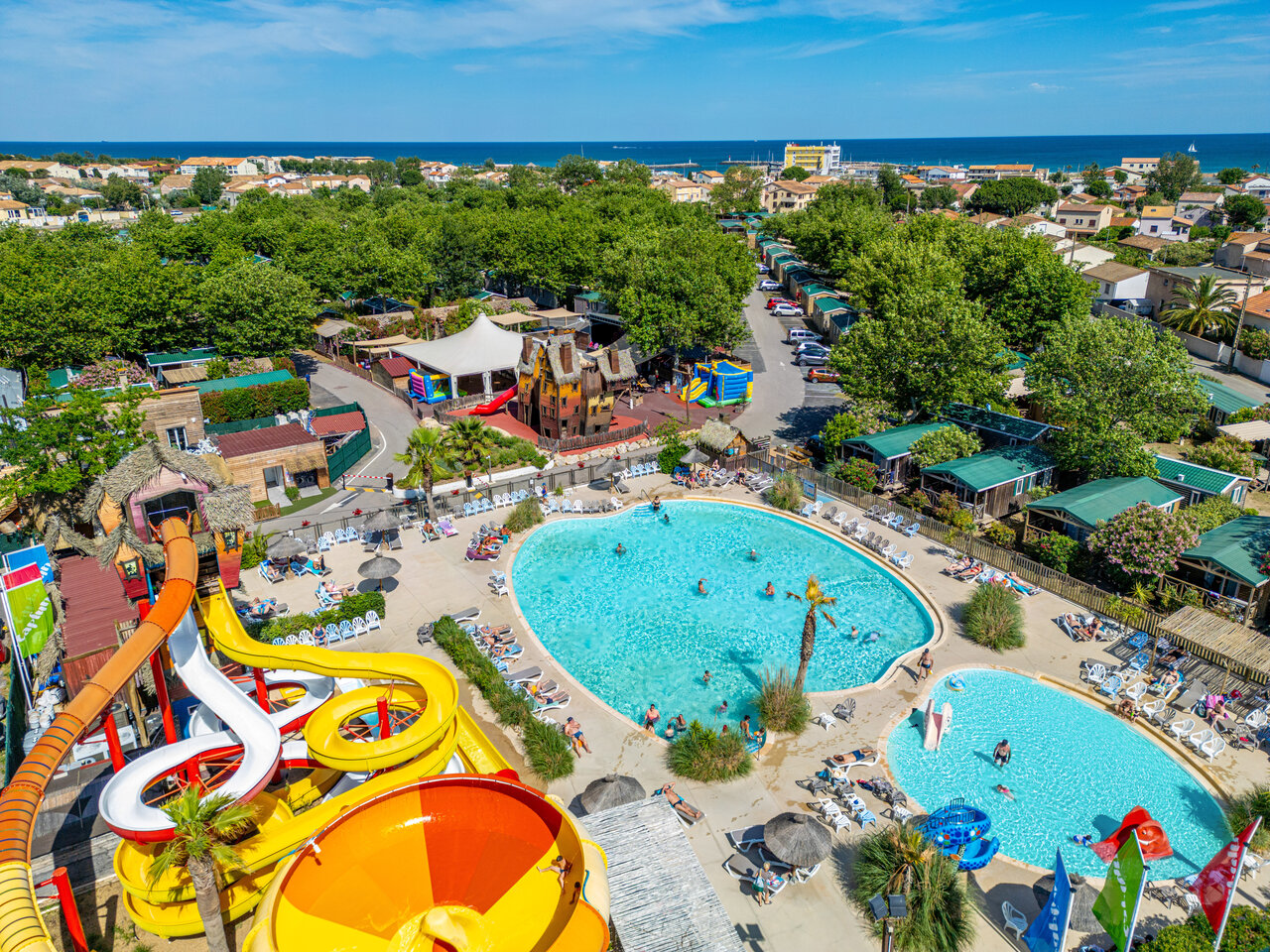 Giant water slides, outdoor pools and play areas at CAPFUN F�erix campsite in MARSEILLAN PLAGE.