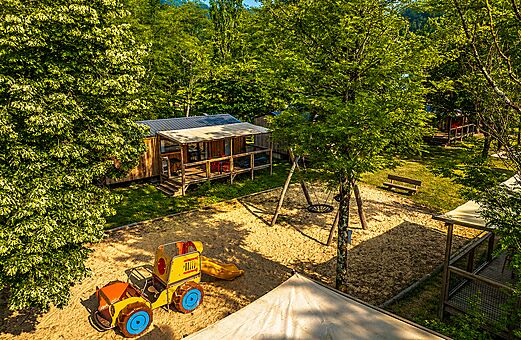 Children's playground, Mobile home at CLICOCHIC Filament campsite in Thoiras (30).
