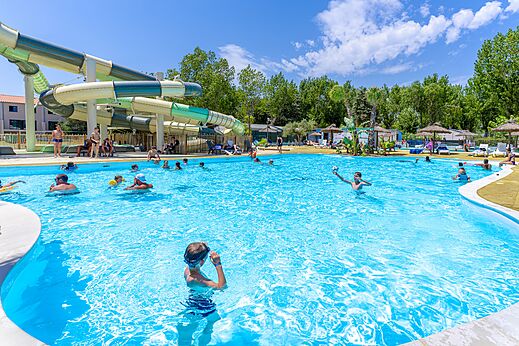 Outdoor pool, giant slides at VAGUES OCEANES Au Flamenco campsite in Argel�s-sur-Mer (66).