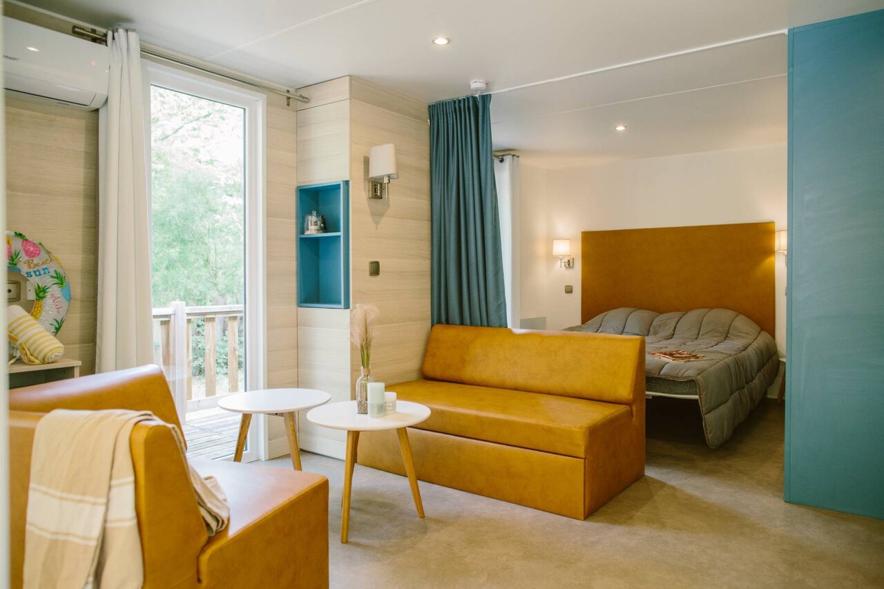 Modern mobile home interior, living room, bedroom, terrace, camping CLICOCHIC La For�t d'Azal�e.