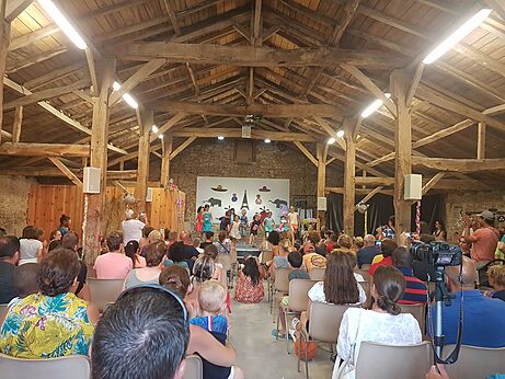 Children's show and audience in animation room at CAPFUN Forges campsite in Avrille (85).