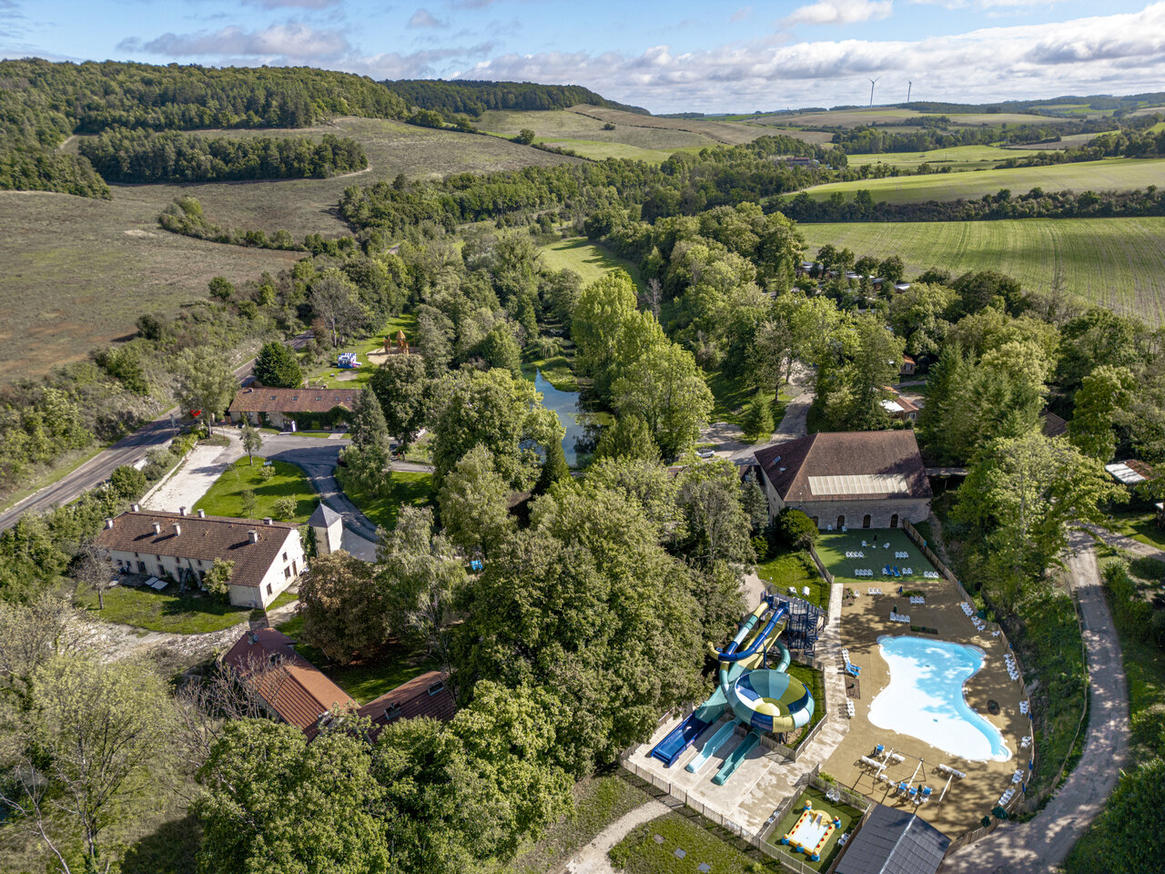 Pool waterslides at CLICOCHIC Forge Sainte Marie campsite in Thonnance-les-Moulins.