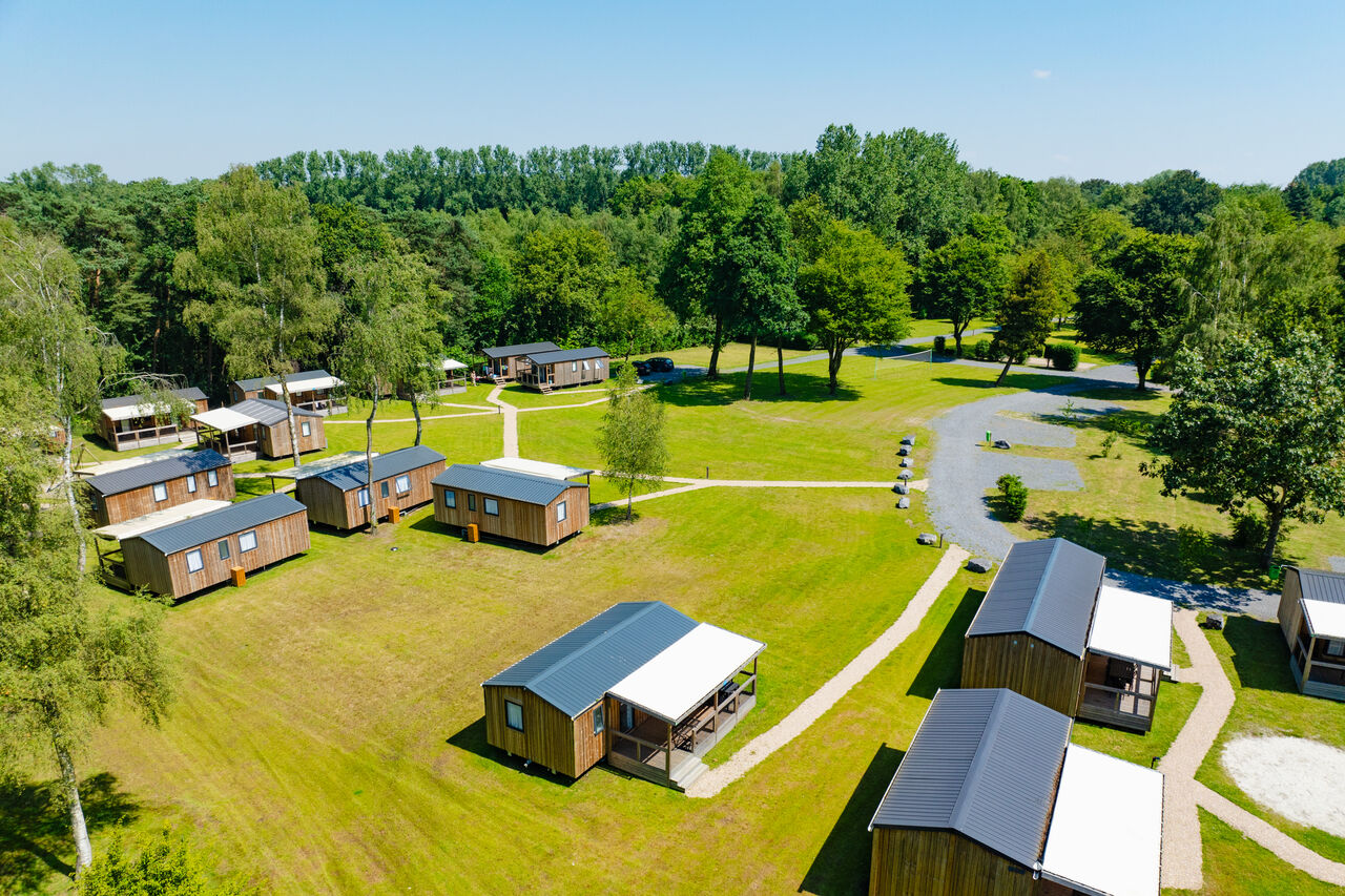 Wooden mobile homes, aerial view of CAPFUN Fort Bedmar campsite in Sint-Gillis-Waas.