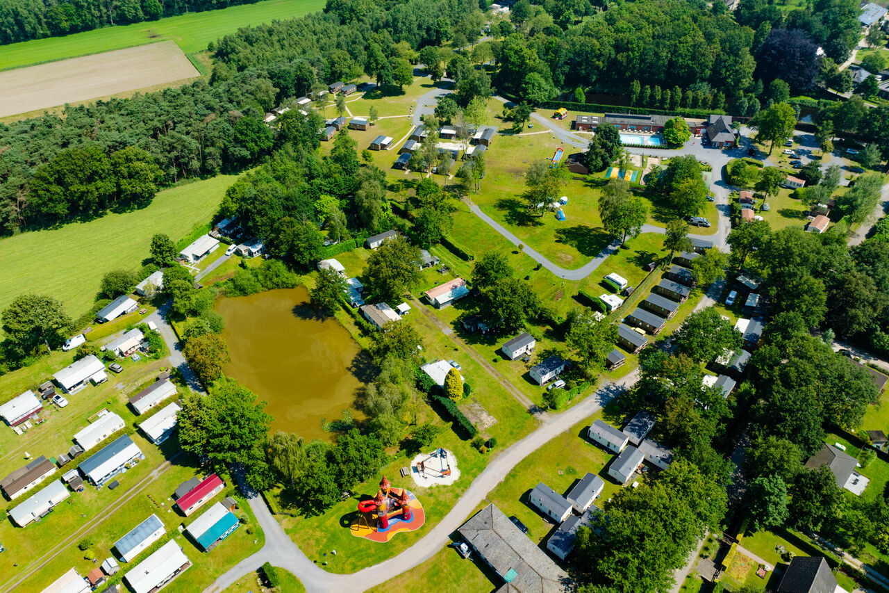 Camping CAPFUN Fort Bedmar: aerial view, mobile homes, pool and nature.