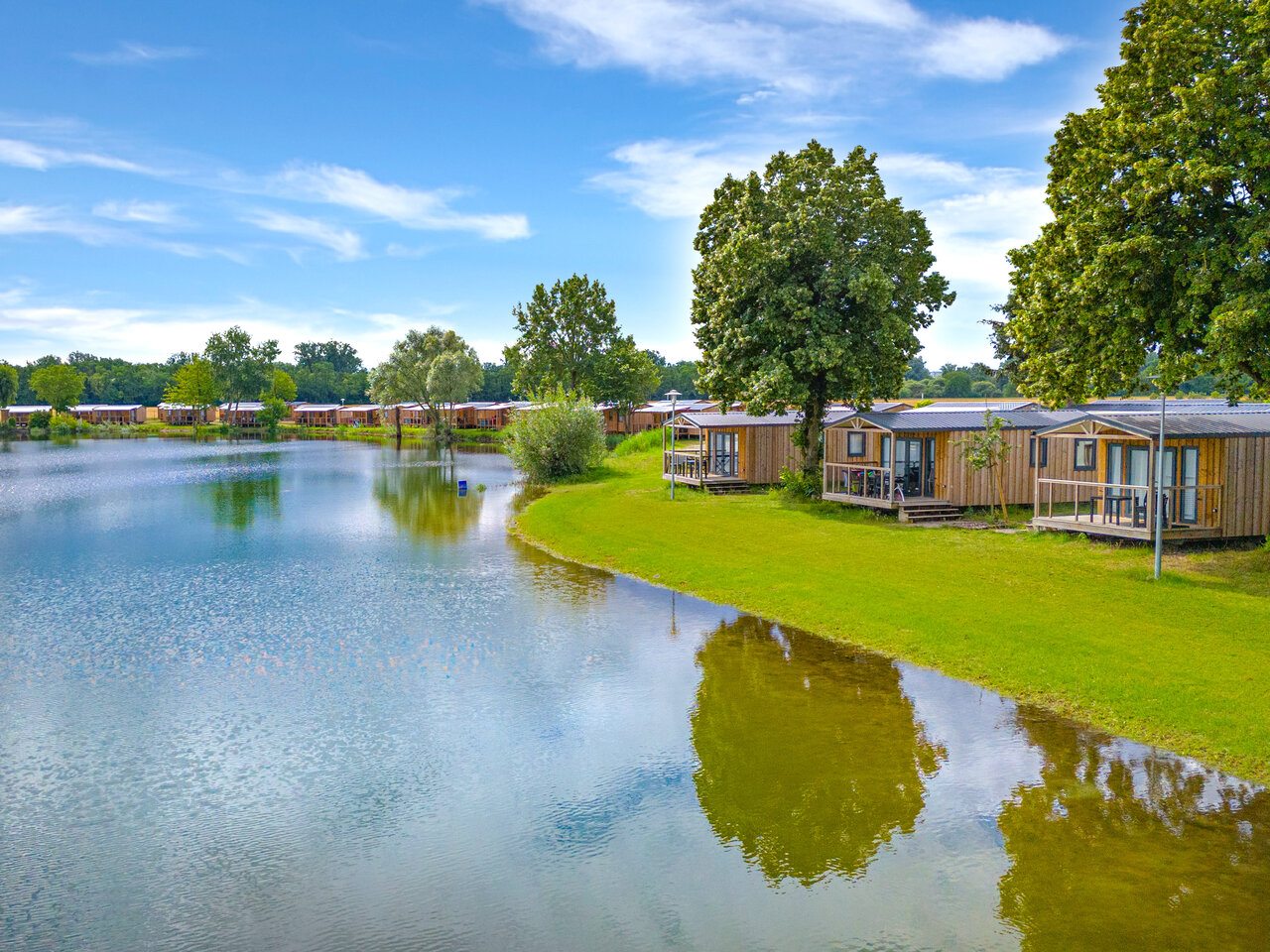 Wooden mobile homes by the lake, CAPFUN Fort Falabraque in Seltz (67).