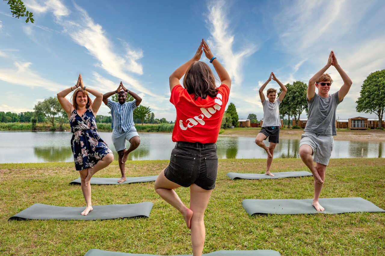 Outdoor yoga for campers at CAPFUN Fort Falabraque in Seltz (67).
