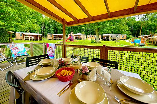 Mobile home terrace at CAPFUN Fredland campsite in Tournan en Brie.