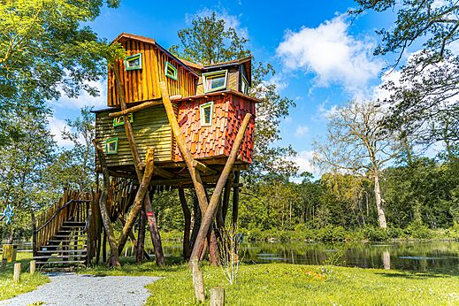 Unusual wooden treehouse on stilts at CAPFUN Fredland campsite in Tournan en Brie.