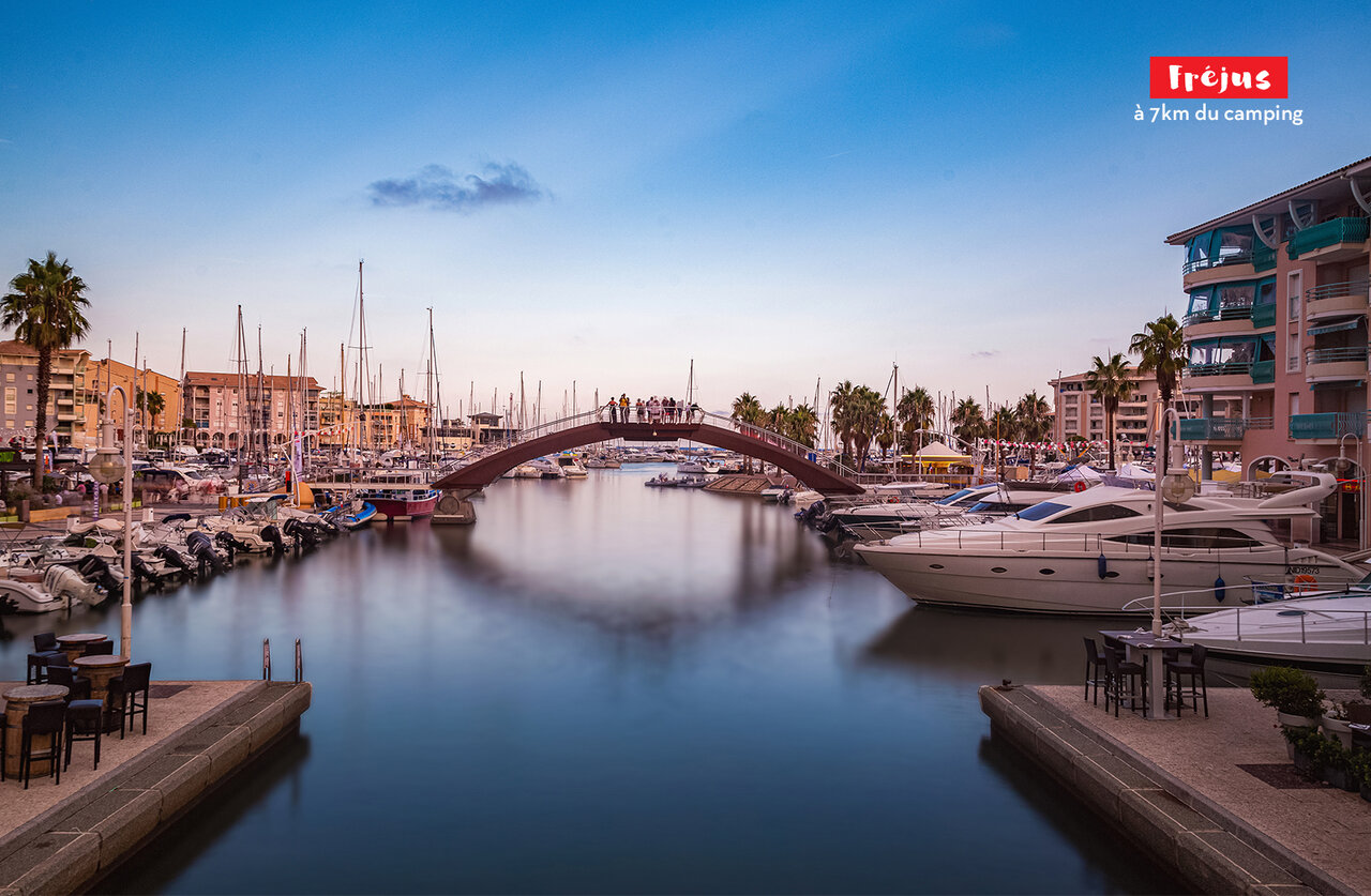 Fr�jus marina with boats and pedestrian bridge, a place to visit.