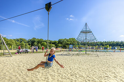Zip line and sand games at CAPFUN De Fruithof campsite in Klijndijk.