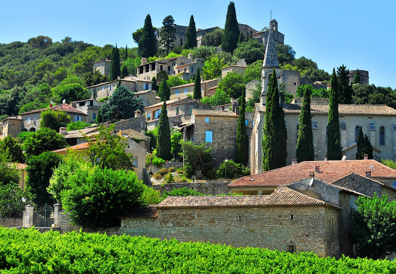 Typical hilltop village, green landscape at CAPFUN Fumades campsite ALLEGRE-LES-FUMADES.