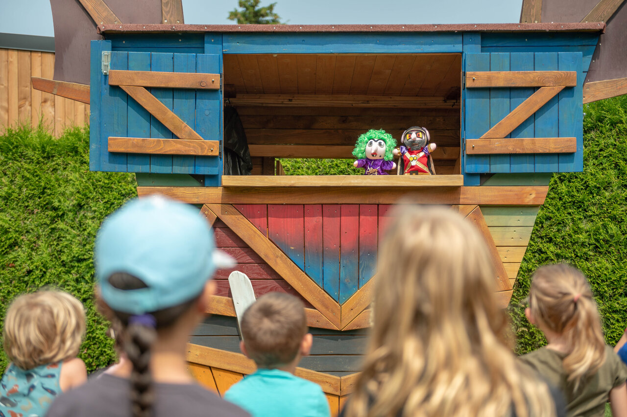 Children's puppet show on outdoor stage at CAPFUN Fuvettes campsite in Malbuisson.