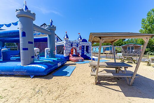 Inflatable castles at CAPFUN Golf campsite in SAINT JEAN DE LA RIVIERE (50).
