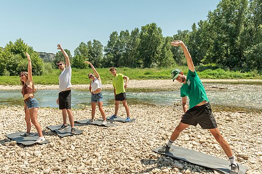 Group stretching at CLICOCHIC Gorges du Gardon, VERS PONT DU GARD.