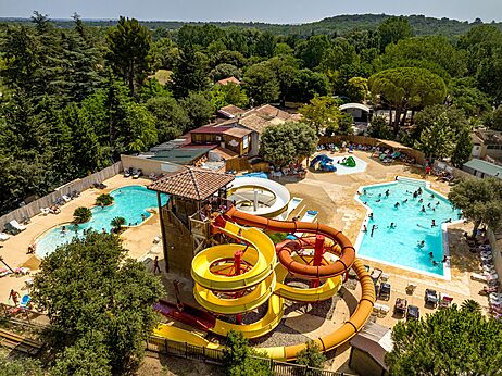 Giant water slides and lively outdoor pools at CLICOCHIC Gorges du Gardon campsite in VERS PONT DU GARD (30).