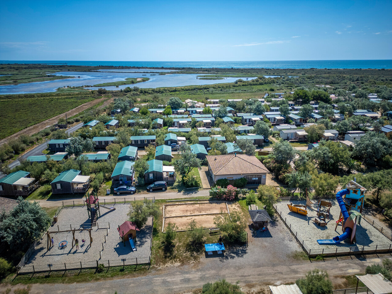 Mobile-homes, playgrounds, sea at CAPFUN Grande Cosse campsite in Saint Pierre la Mer (11).