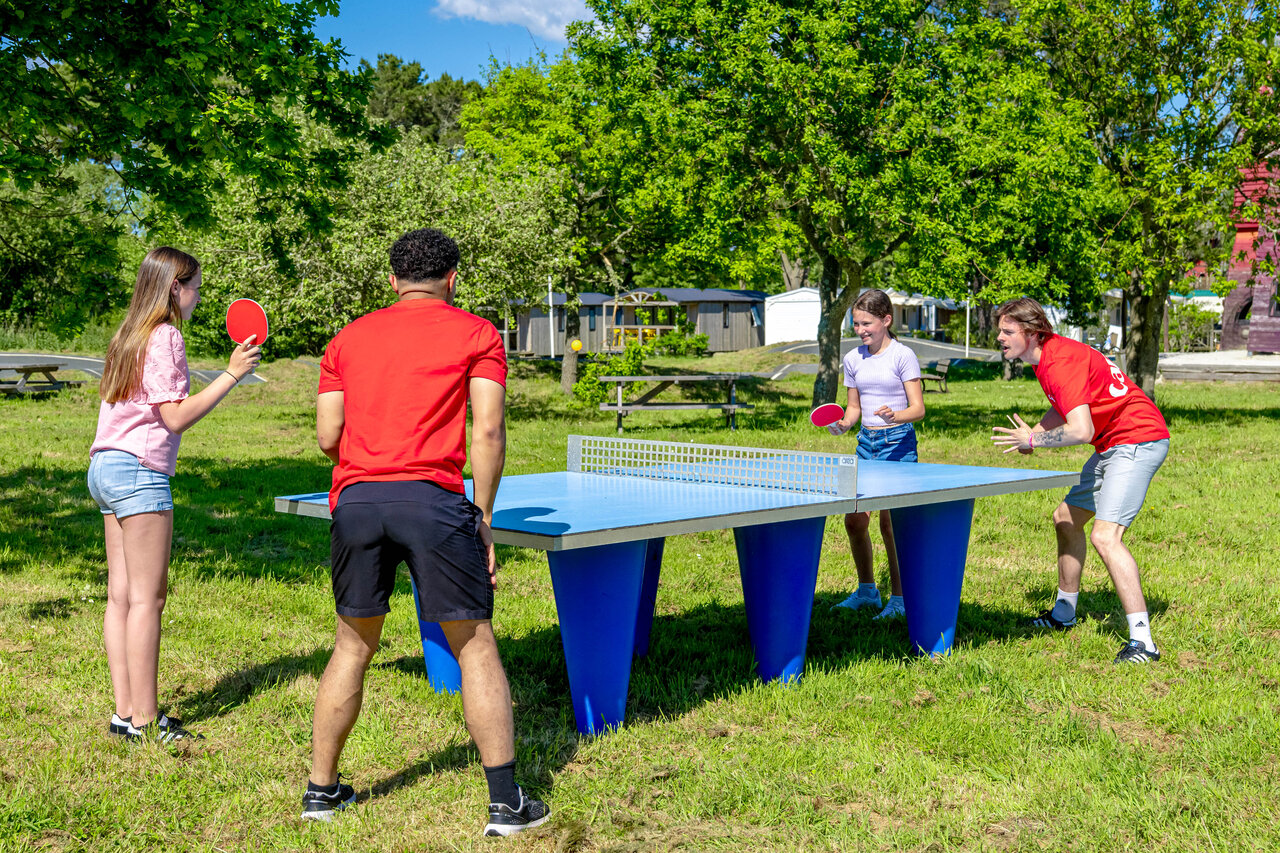 Outdoor table tennis game for young people at CAPFUN Grand Large, FOUESNANT (29).