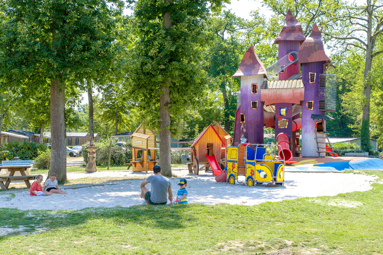 Giant play castle, slides, sand at CAPFUN Grenouill�re campsite in Su�vres.