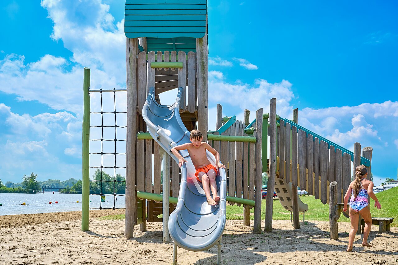 Slide, playground, beach at CAPFUN Groene Eiland campsite in Appeltern.