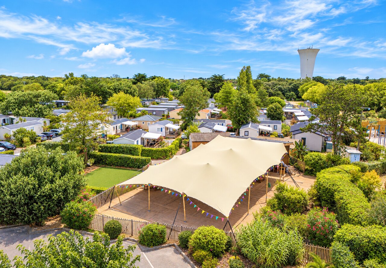 Entertainment tent, Mobile homes and aerial view, camping VAGUES OCEANES Grosses Pierres.