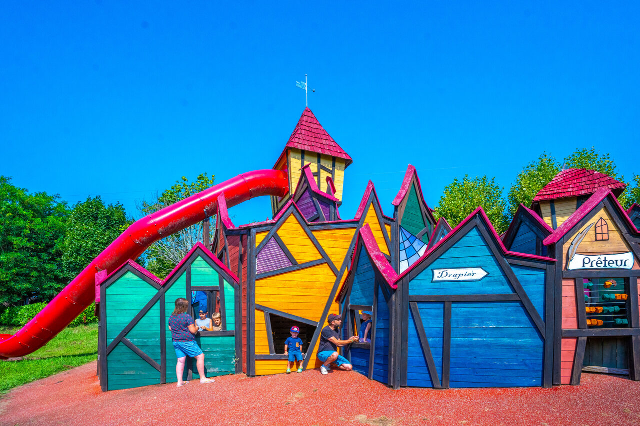 Slide, colorful playground at CAPFUN Hauts de Ratebout, STE FOY DE BELVES.