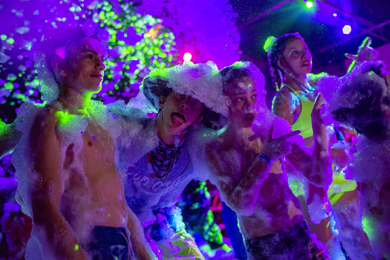 Foam party young people at CAPFUN Hauts de Ratebout campsite in STE FOY DE BELVES.