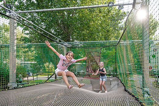 Children playing on net trampoline at CLICOCHIC Havre de Berni�res campsite (14).