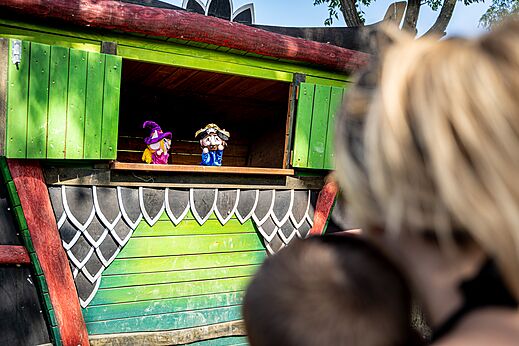 Puppet show in colorful play structure at campsite CLICOCHIC Havre de Berni�res in Berni�res-sur-Mer (14).