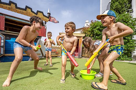Water games for children at CAPFUN Hermitage campsite in SERIGNAN (34).